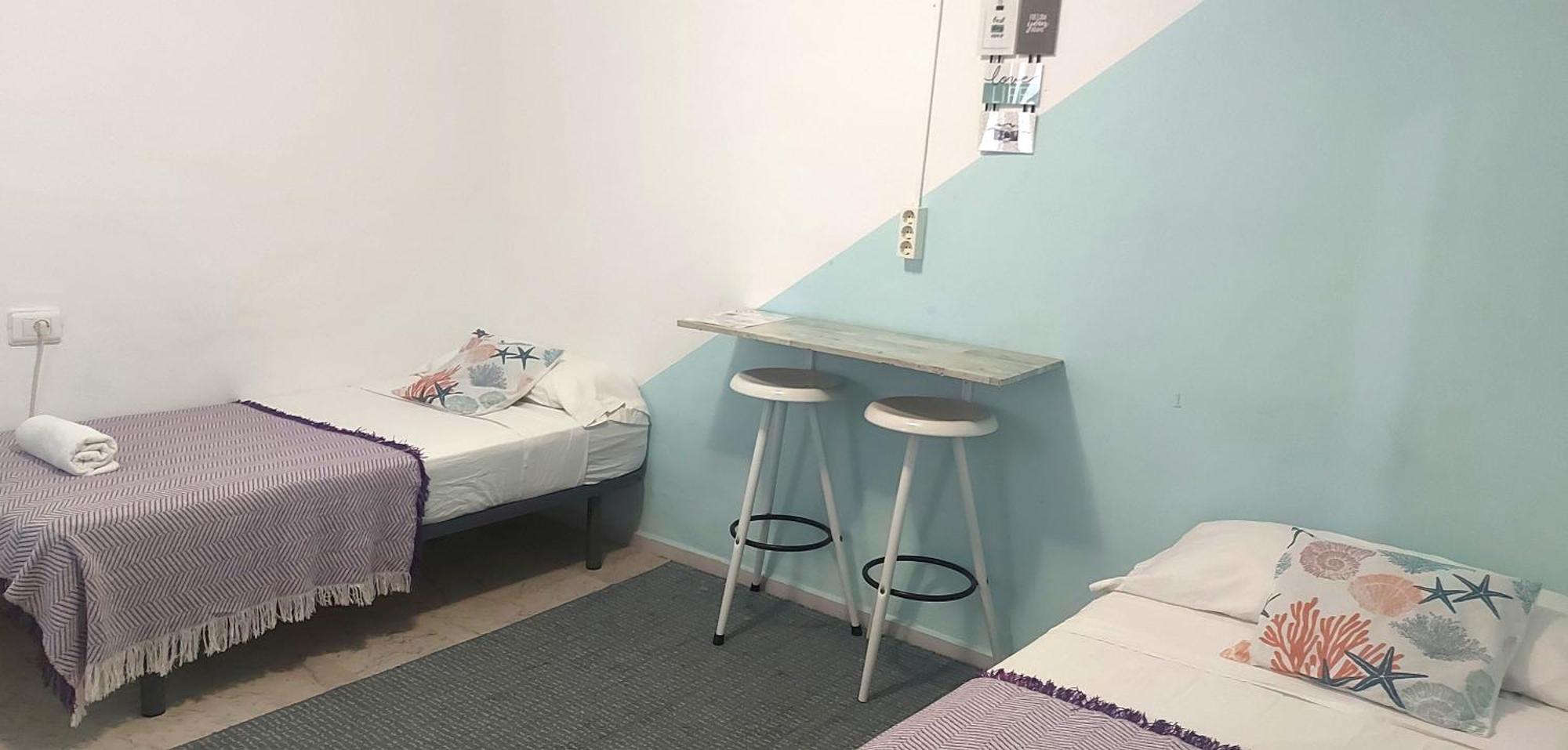 Quarto com 2 Camas de Solteiro
