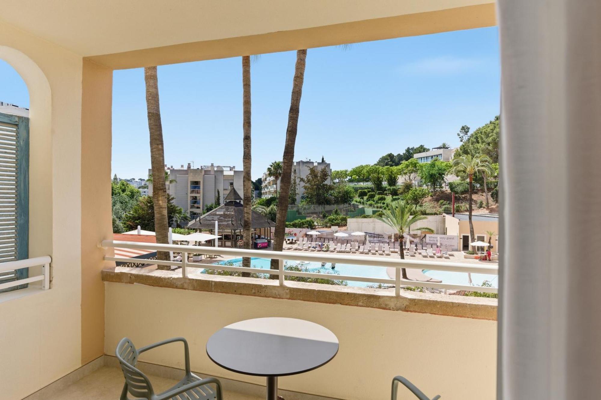 One-Bedroom Apartment Balcony Pool View,1772905802:JPEG